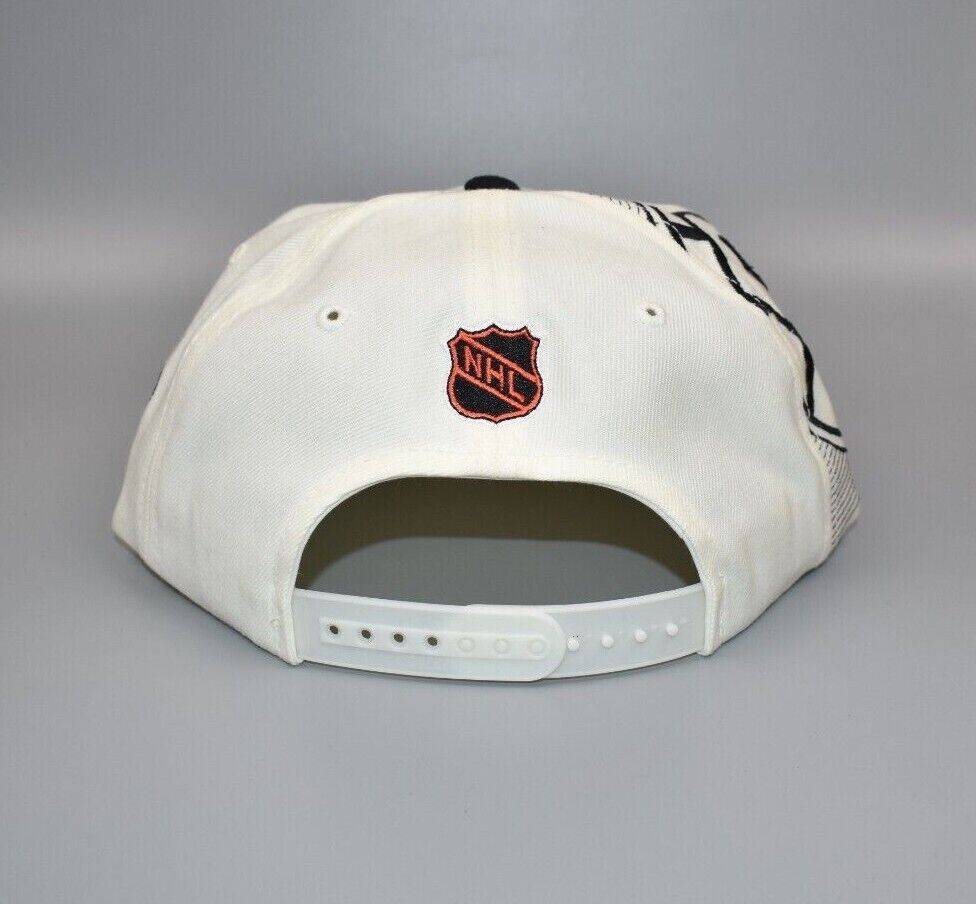 Bruins in Your Face White Snapback Cap | Boston ProShop